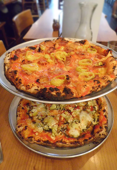 Soppressata and Artichoke pizzas from A Tavola