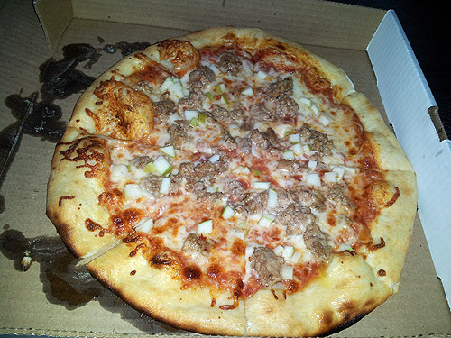 #4 pizza with tomato, sausage, smoked mozzarella and apple