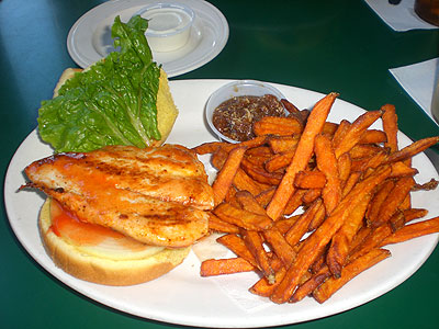 Buffalo Chicken sandwich with Sweet Potato Fries and Calypso Sauce