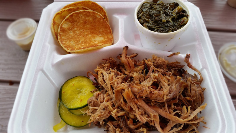 pulled pork, collard greens and hoe cakes