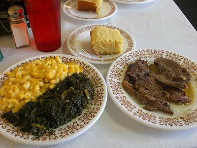 Jerk lamb w/mac & cheese and greens