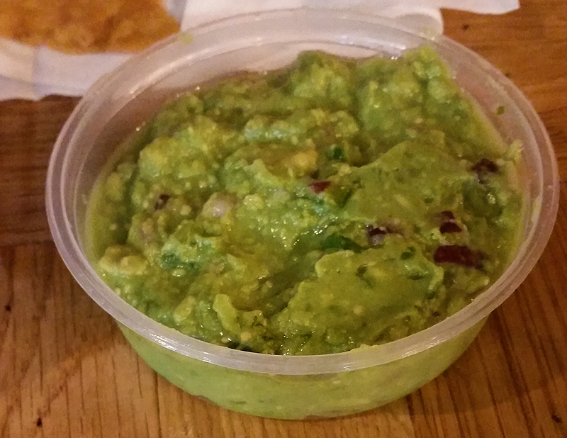 guac in a plastic tub